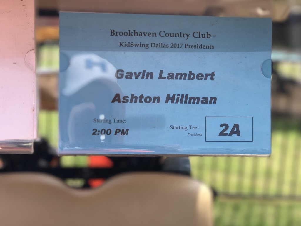 Andrew Hillman. Brookhaven Country Club cart sign for KidSwing Dallas 2017 Presidents, listing Gavin Lambert and Ashton Hillman, 2:00 PM, tee 2A